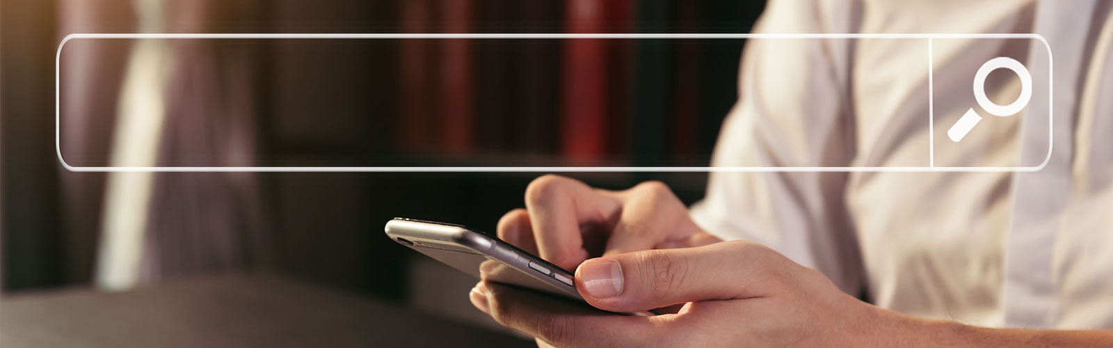 A lady searching online with her phone. 