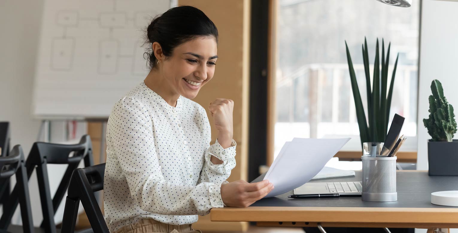 Lady celebrating getting a loan