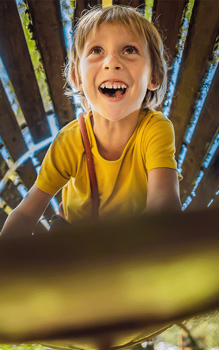 Young boy having fun at the fair. 