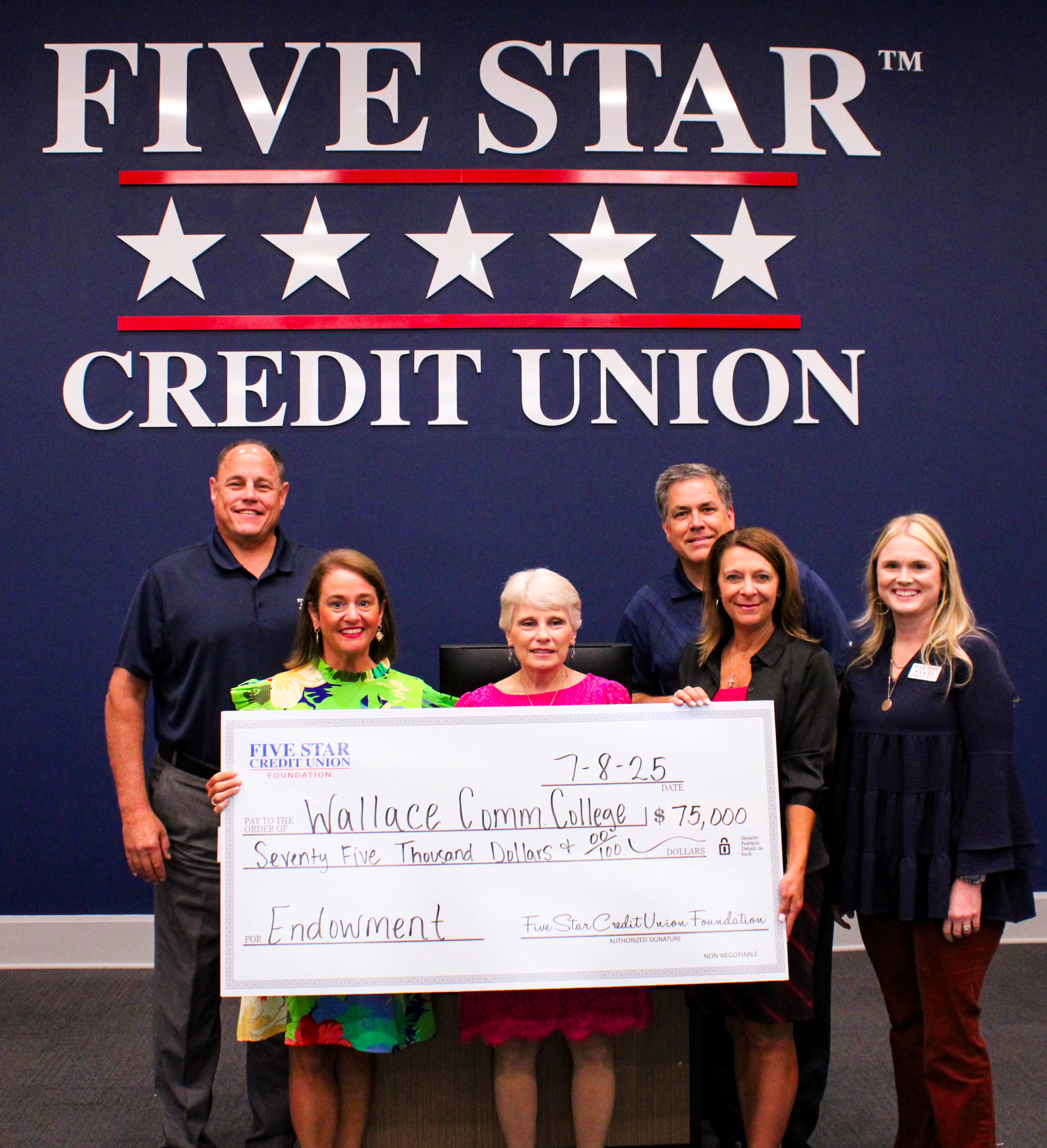 Wallace Community College scholarship check presentation. 